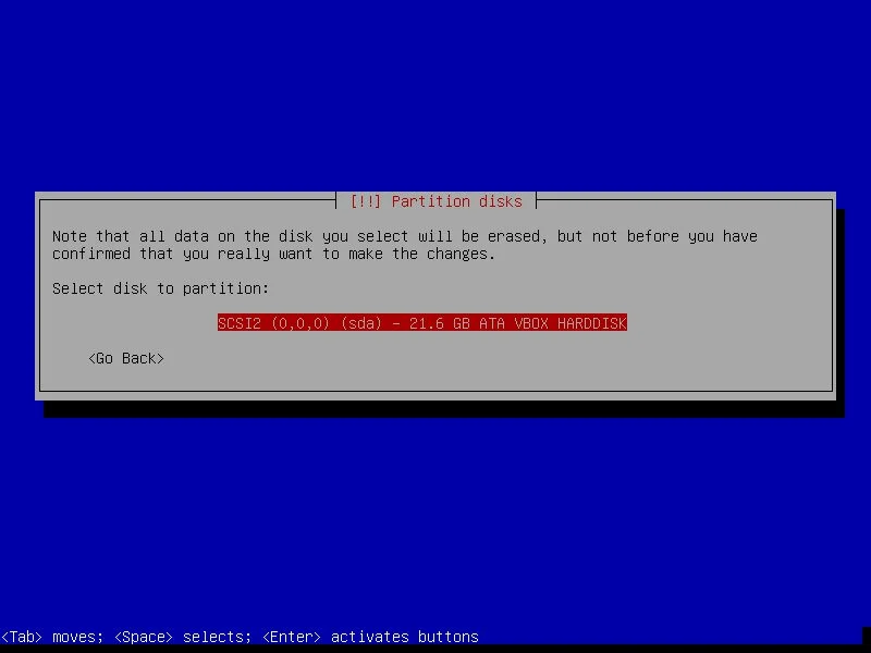 Memilih hard disk target partisi pada installer Debian 11